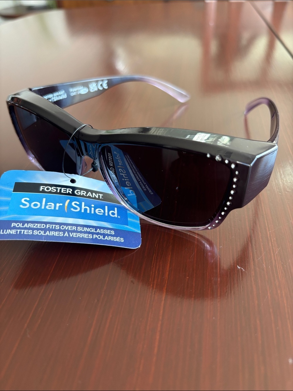 Foster Grant Solar Shield polarized,tortoise shell plum arm/lens,over glasses